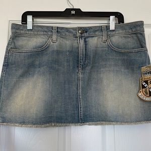 Juicy Couture denim mini-skirt. Size 31. NWT.